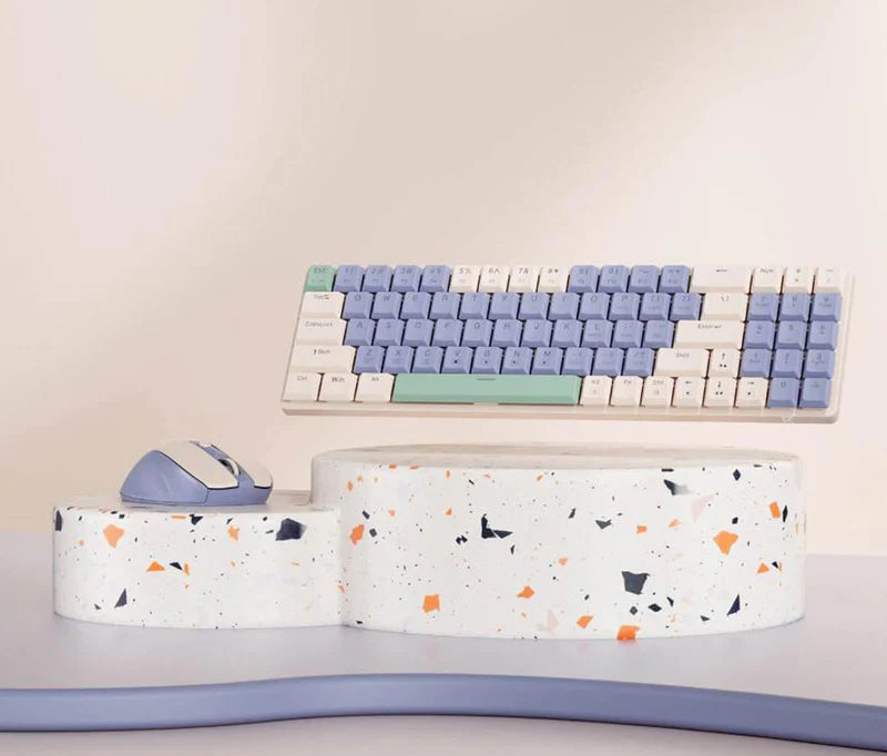 2.4G Wireless Keyboard and Mouse Combo with a colorful wrist rest on a desk.